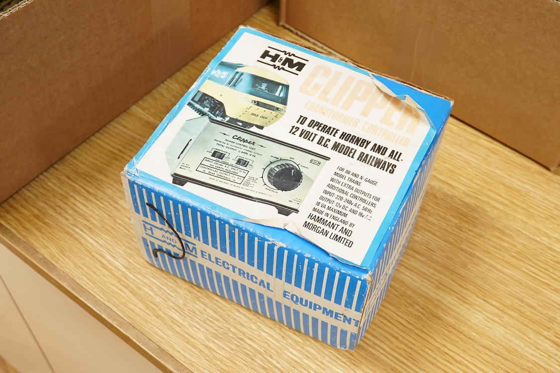 A collection of Hornby Dublo railway for 3-rail running, including two locomotives; an LMS Duchess of Athol 4-6-2, locomotive box, tender unboxed, and a boxed BR Standard Class 4 2-6-4T, 80054, together with five boxed b